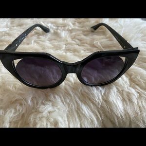 Sunglasses by Guess
